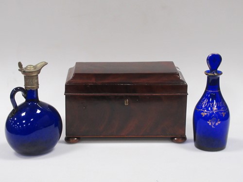 Lot 30 - A 19th century mahogany tea caddy with three...