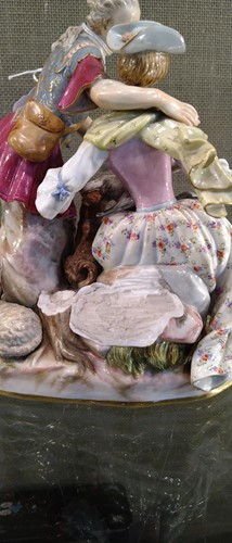 Lot 8 - A Meissen figure group “The Secret Letter”,...