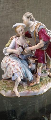 Lot 8 - A Meissen figure group “The Secret Letter”,...