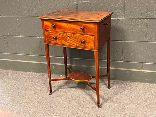 Lot 794 - A 19th century mahogany work table with inlaid...