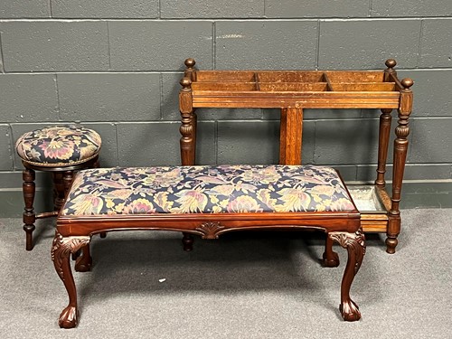 Lot 700 - An early 20th century oak six division stick...