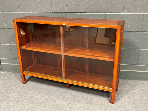 Lot 703 - A modern Chinese hardwood bookcase with glazed...