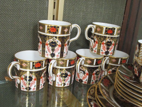 Lot 14 - A Royal Crown Derby imari pattern coffee...