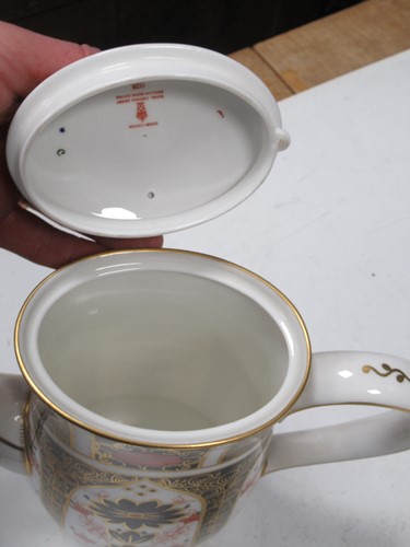 Lot 14 - A Royal Crown Derby imari pattern coffee...