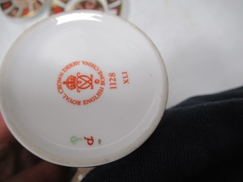 Lot 14 - A Royal Crown Derby imari pattern coffee...