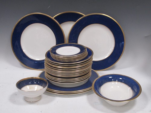 Lot 100 - A Coalport Athlone blue part dinner service...