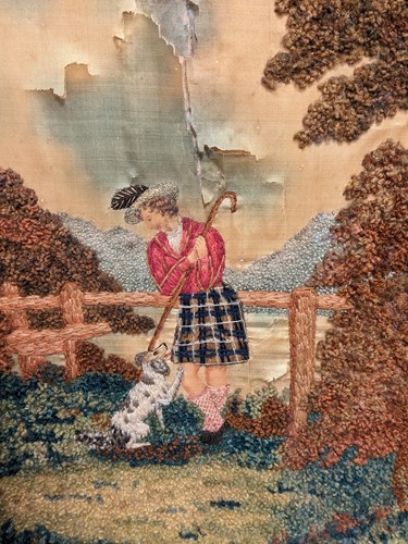 Lot 496 - A 19th century silkwork of a highlander with...