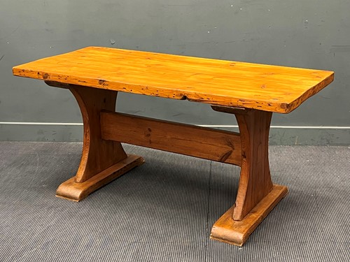 Lot 815 - A pine trestle type dining table. 76cms x...