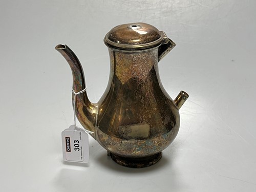 Lot 303 - A continental metalwares coffee pot (a/f)...