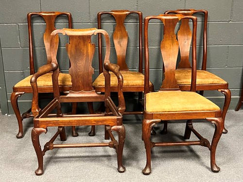 Lot 727 - A set of four Queen Anne style walnut dining...