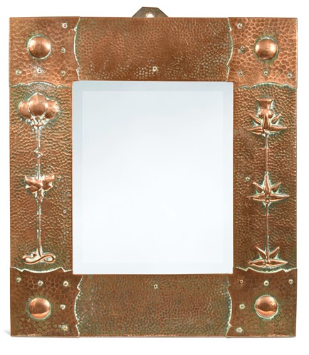 Lot 206 - J & F Pool of Hayle, an Arts & Crafts hammered copper and bevelled glass wall mirror
