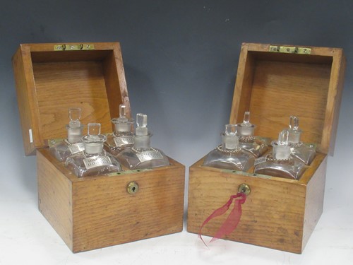 Lot 134 - A pair of oak decanter boxes, each fitted with...