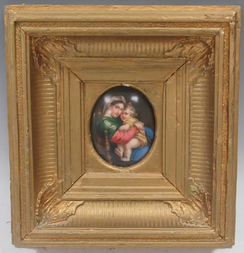 Lot 54 - An oval porcelain plaque of the Madonna della...