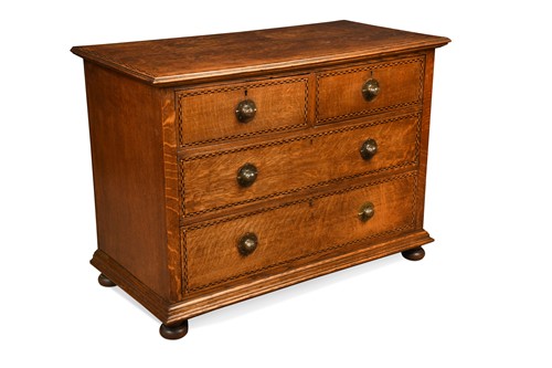 Lot 220 - Shapland & Petter, Barnstaple, an Arts & Crafts oak chest of drawers