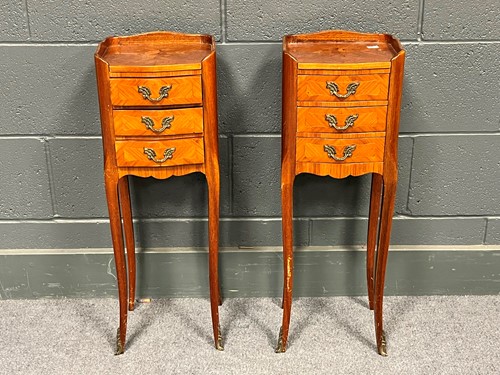 Lot 768 - A pair of reproduction French three drawer...