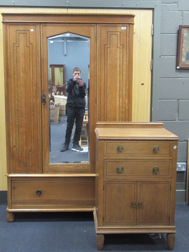 Lot 856 - An Edwardian pale oak chest of two drawers...