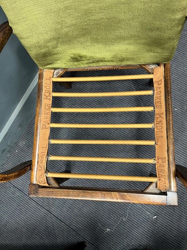 Lot 864 - A vintage Parker Knoll patent easy armchair, a...