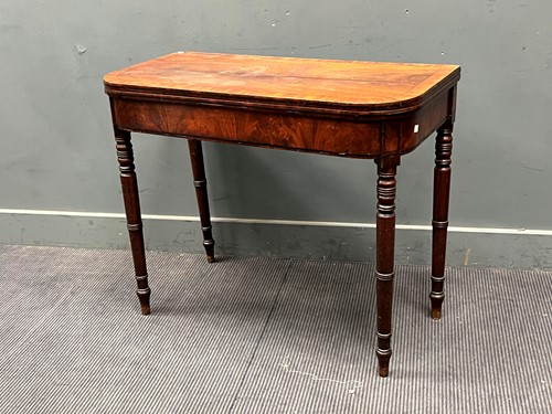 Lot 839 - A George IV mahogany foldover top card table...