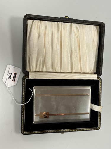 Lot 305 - A cased silver pocket cigarette case with rose...