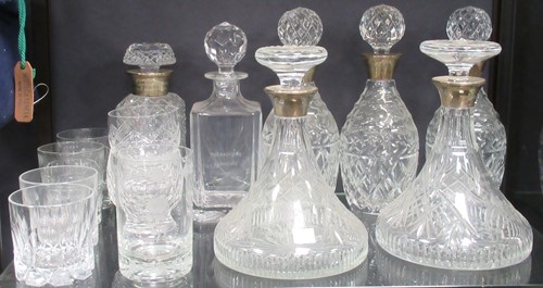 Lot 191 - Six glass decanters with silver collars...