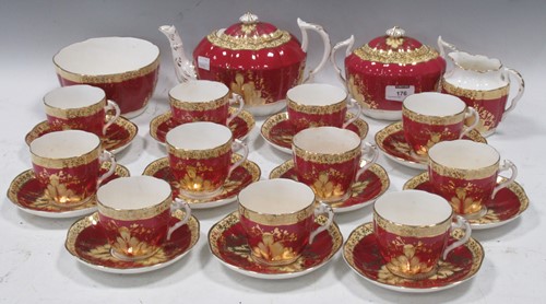 Lot 176 - A Victorian gilded forty two piece tea set
