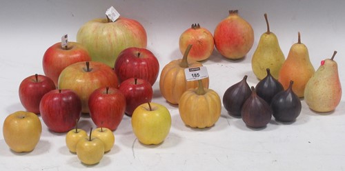 Lot 185 - A collection of painted naturalistic fruits,...