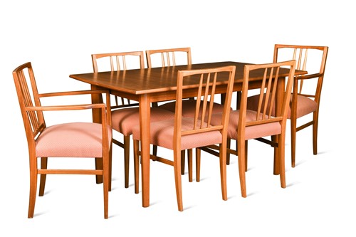 Lot 213 - Gordon Russell, a walnut and teak extending dining table and eight chairs