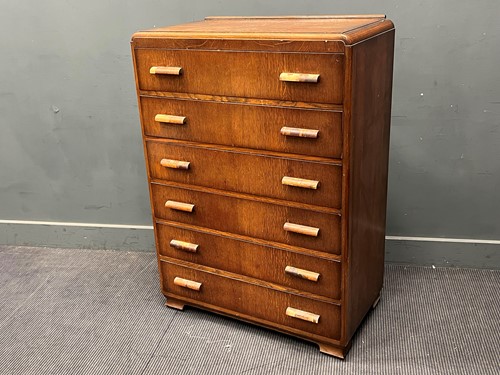 Lot 851 - A modern oak chest of six long drawers. 117cms...