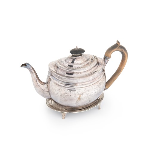 Lot 588 - A George III silver tea pot with associated stand