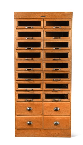 Lot 243 - An oak Haberdasher's cabinet