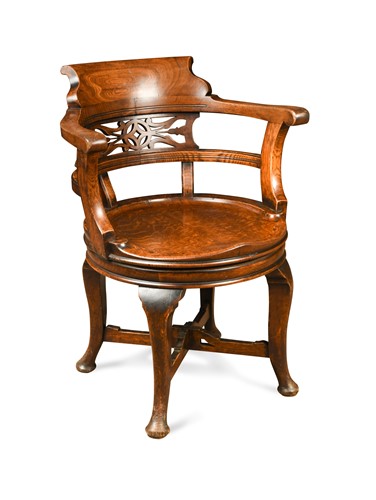 Lot 709 - A revolving oak desk chair, circa 1900