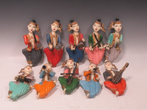 Lot 18 - A group of 10 painted wooden musical...