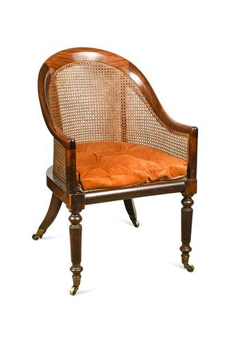 Lot 630 - A caned mahogany bergere armchair, 19th century