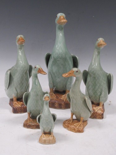 Lot 31 - A set of six celedon type ceramic ducks of...