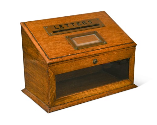 Lot 595 - An Edwardian oak country house letter box