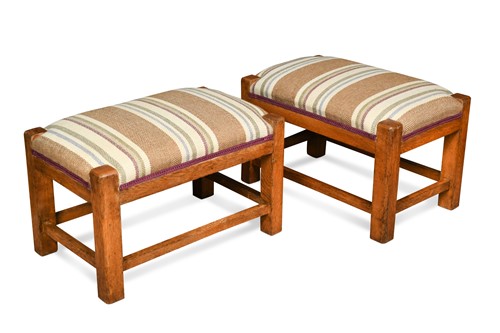 Lot 251 - A pair of Cotswold School pale oak footstools, circa 1930