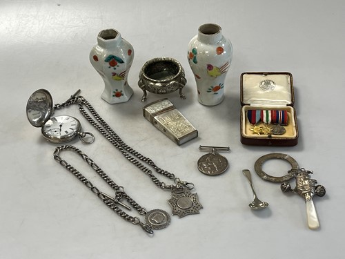 Lot 387 - A silver bound mother-of-pearl case, a silver...