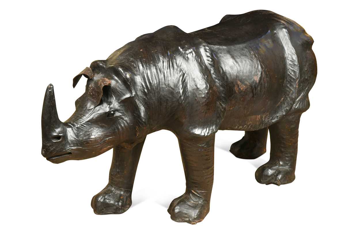 Lot 117 - A large scale leather covered rhino