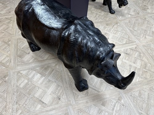 Lot 117 - A large scale leather covered rhino