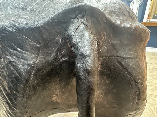 Lot 117 - A large scale leather covered rhino