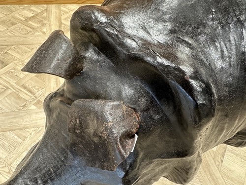 Lot 117 - A large scale leather covered rhino
