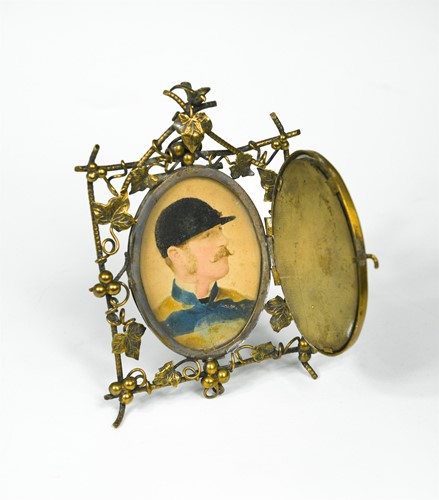 Lot 174 - A portrait miniature of a jockey, overpainted...