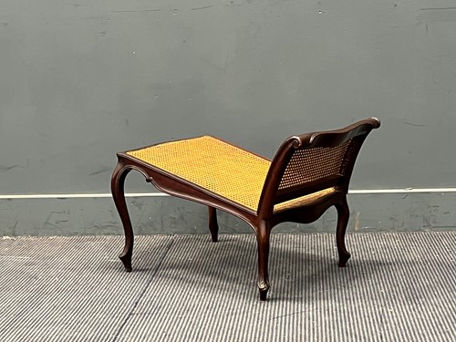 Lot 809 - A Victorian caned gout stool on cabriole legs...