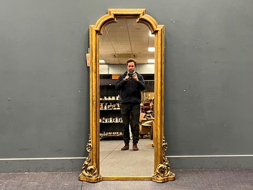 Lot 723 - A Victorian gilt wall mirror in the Gothic...