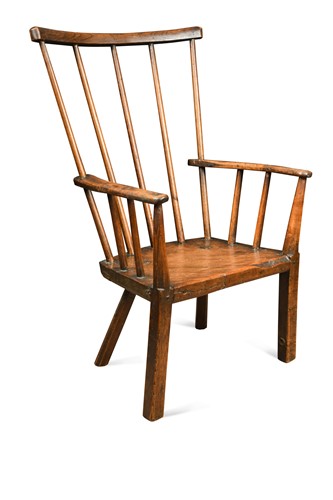 Lot 469 - A primitive ash and birch stick back armchair