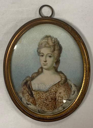 Lot 399 - A collection of four portrait miniatures