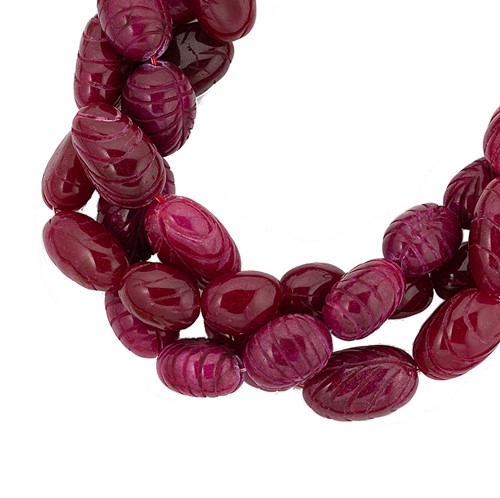 Lot 39 - A carved ruby bead necklace