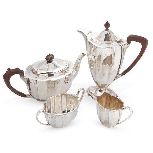 Lot 690 - Edinburgh - A George VI silver 3-piece tea set with one addition