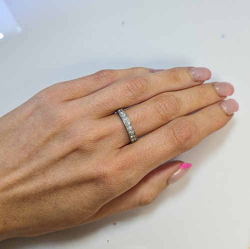 Lot 272 - Tiffany & Co - A diamond set full eternity ring