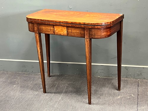 Lot 746 - A Regency mahogany fold-over card table 76 x...